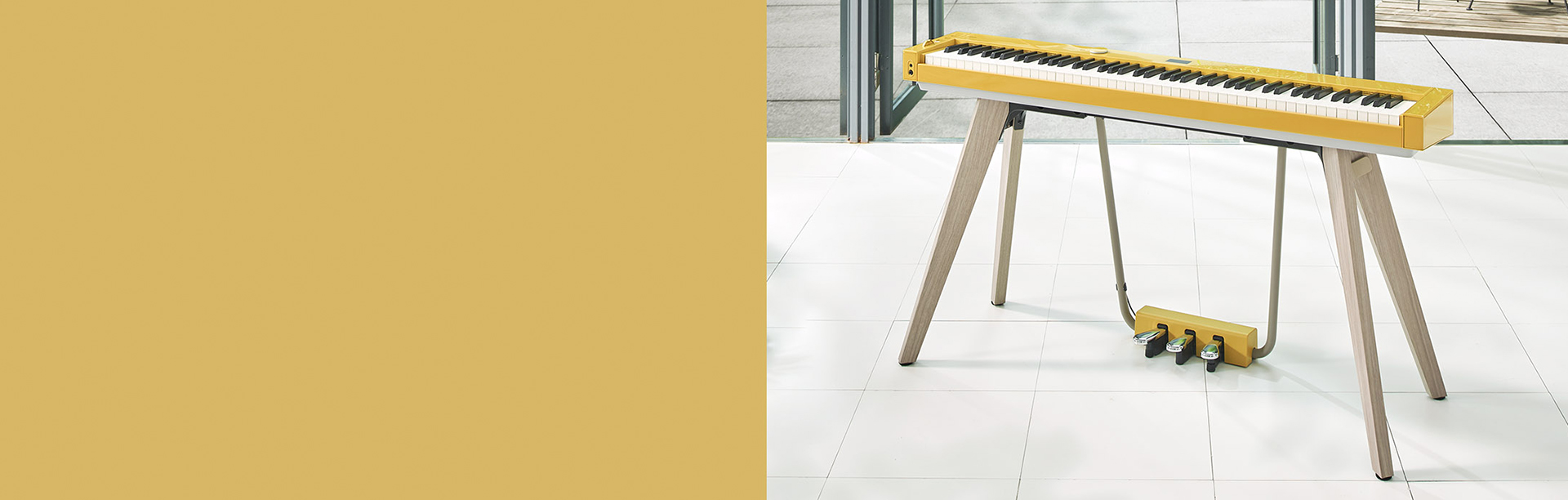 Yellow Privia PX-S7000 on keyboard stand